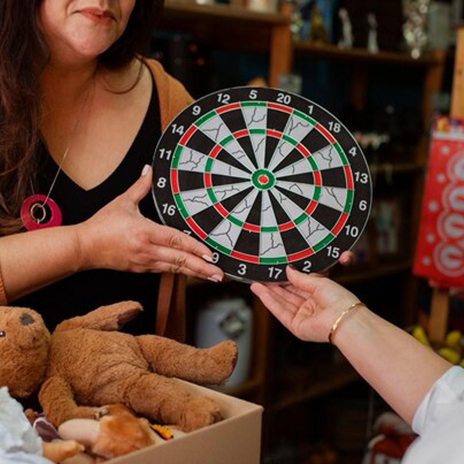 Wukusy magnetic dart board game set with six safe darts, ideal for kids and adults, featuring colorful magnetic target surface