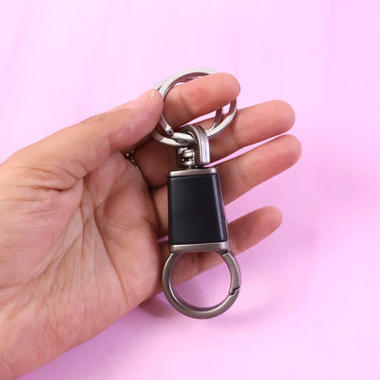 Wukusy premium dual ring metal key holder with rotating swivel, showing sturdy metal construction and secure key rings.