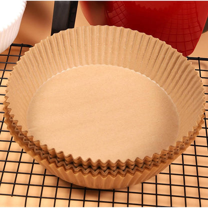 Set of 50 round Wukusy disposable paper liners for air fryers, 160mm x 45mm, ideal for home and kitchen cooking.