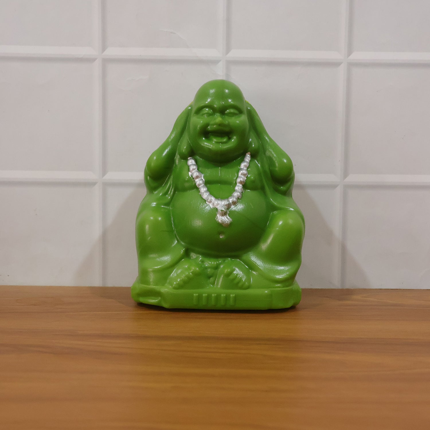 Wukusy Laughing Buddha coin bank, a ceramic money saving box with a smiling Buddha design for saving coins.