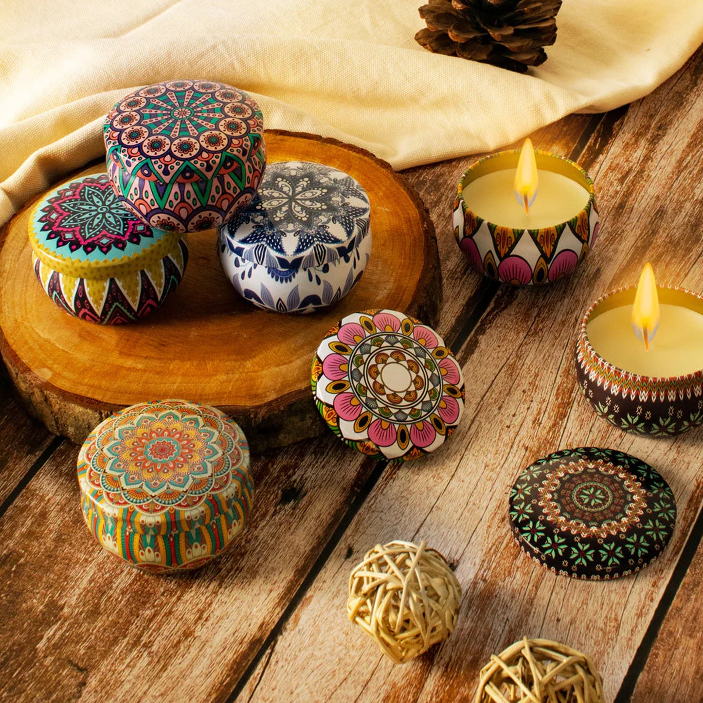Set of four Wukusy decorative metal candle containers with intricate mandala prints, perfect for home decor or candles.