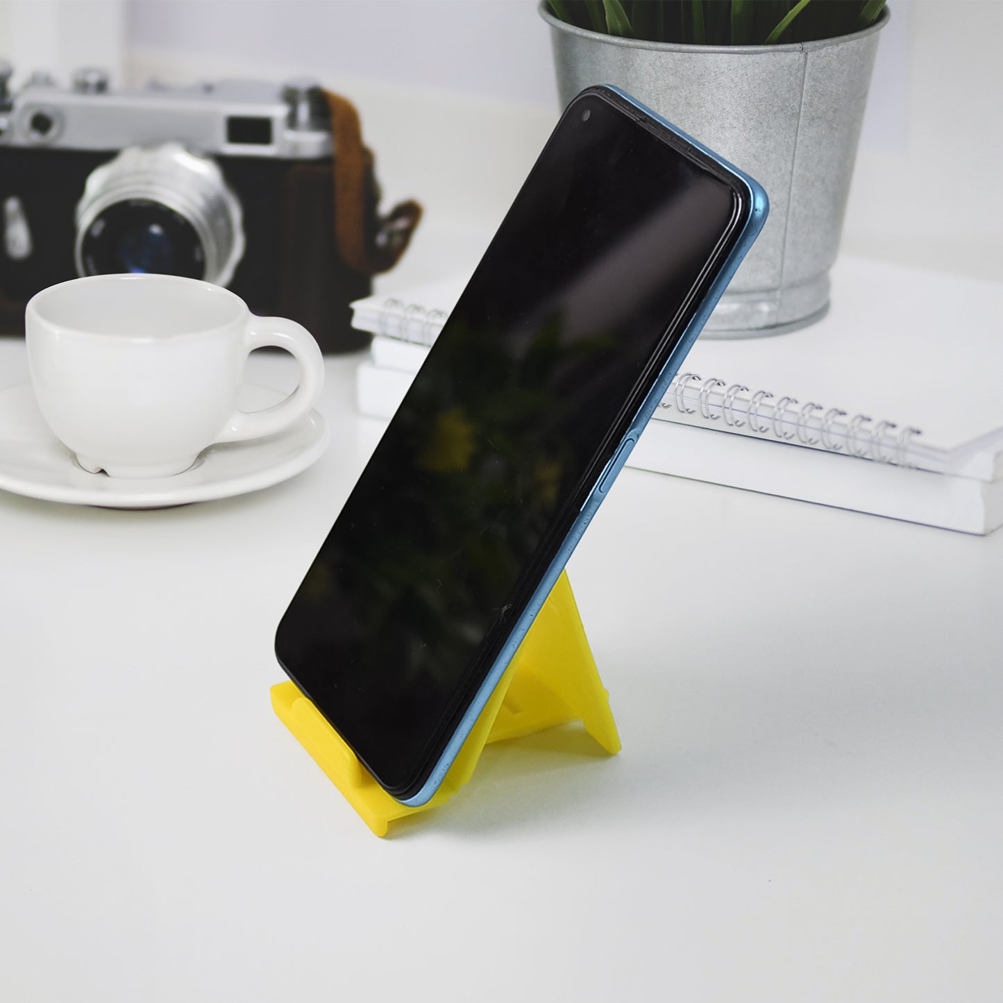 Wukusy adjustable foldable plastic mobile phone stand in mixed colors, portable and lightweight for hands-free device use.