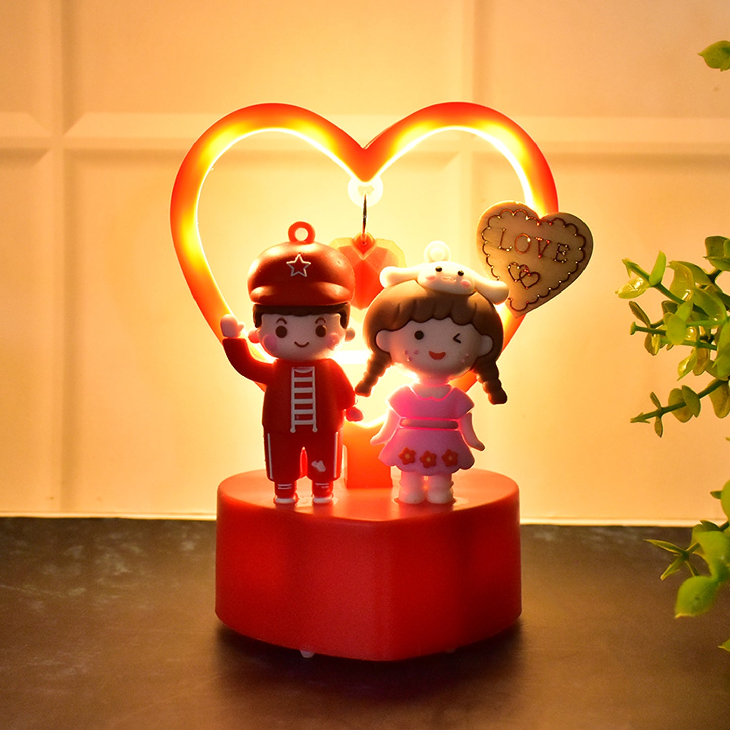 Cute romantic couple love showpiece with heart frame by Wukusy, featuring a detailed couple figurine inside a heart-shaped frame.