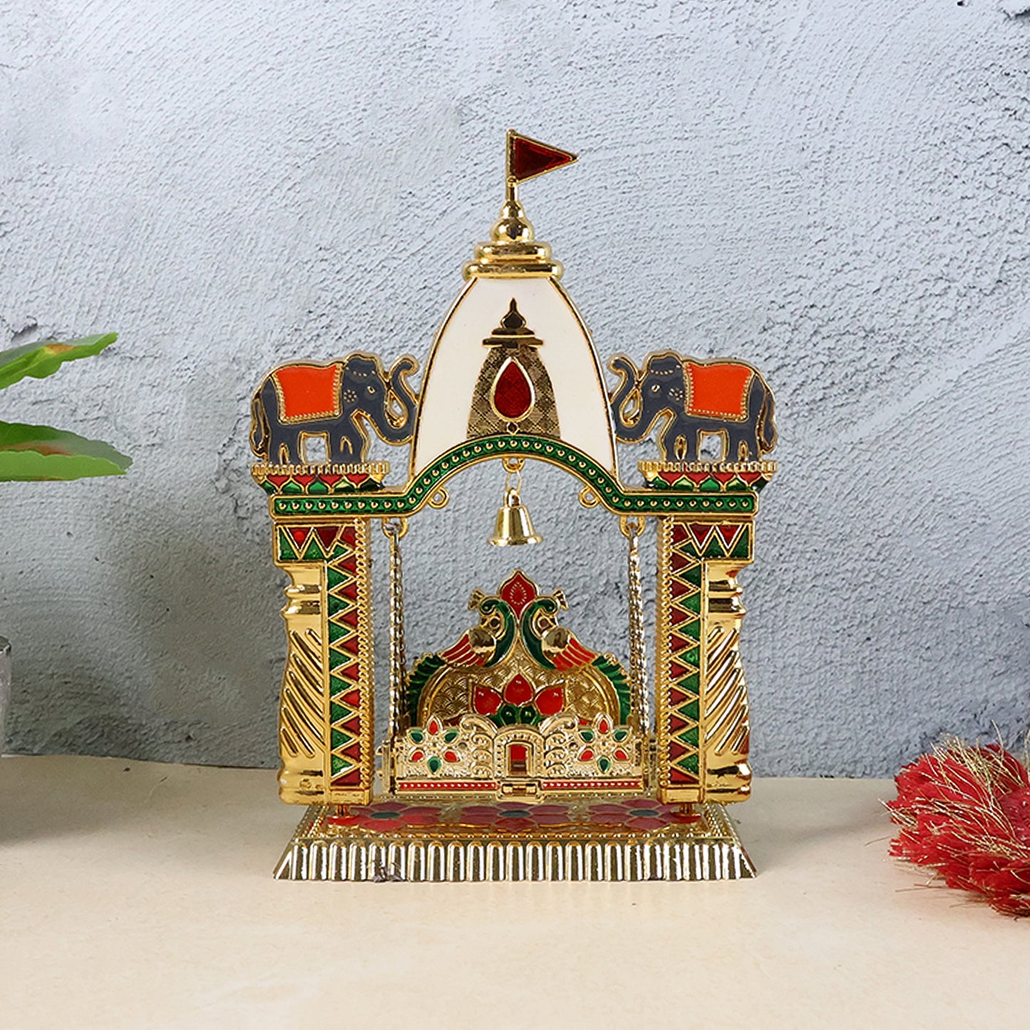Traditional decorative Pooja Jhula Mandir from Wukusy, featuring intricate wood craftsmanship and detailed design for religious worship.
