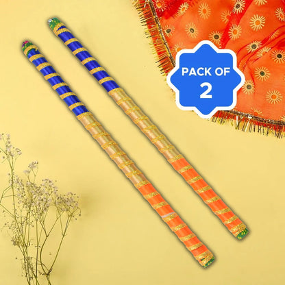 Pair of traditional decorative Dandiya sticks for Navratri Garba, featuring colorful designs by Wukusy, suitable for festive dance celebrations.