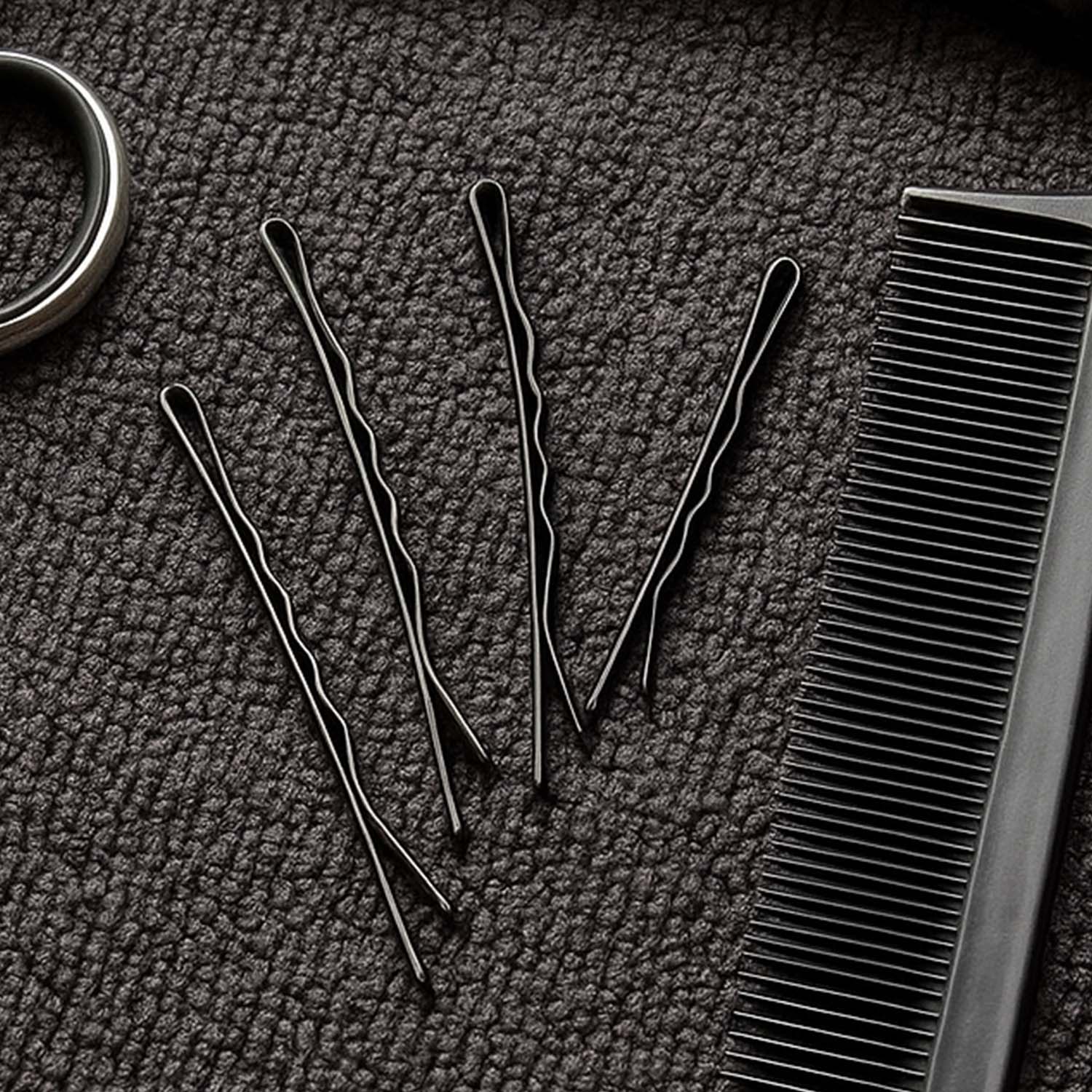 Set of 24 black Wukusy hair bobby pins, neatly arranged on a white background, ideal for securing hair styles.