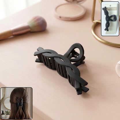 Wukusy stylish twist design hair claw clip, 1 piece, shown holding hair with a sleek twist pattern and durable clasp.