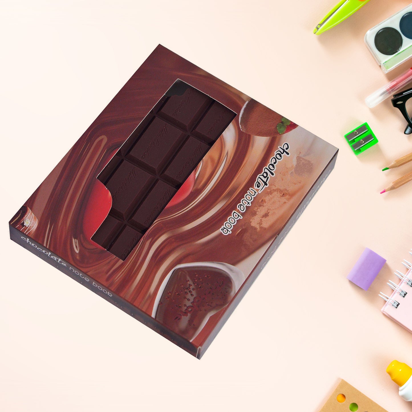 Small Wukusy chocolate-scented diary in rectangular shape with plain pages, designed for kids, featuring a chocolate bite design.