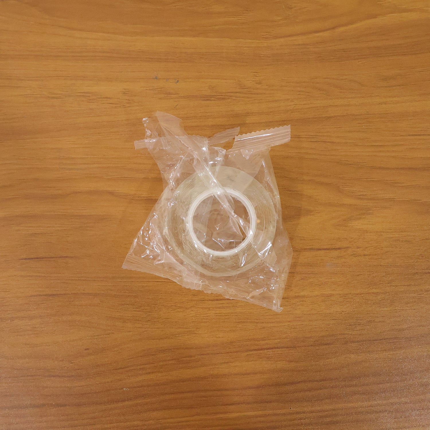 Heavy duty transparent double-sided nano adhesive tape by Wukusy, 70x25mm, showing the tape applied for strong mounting.