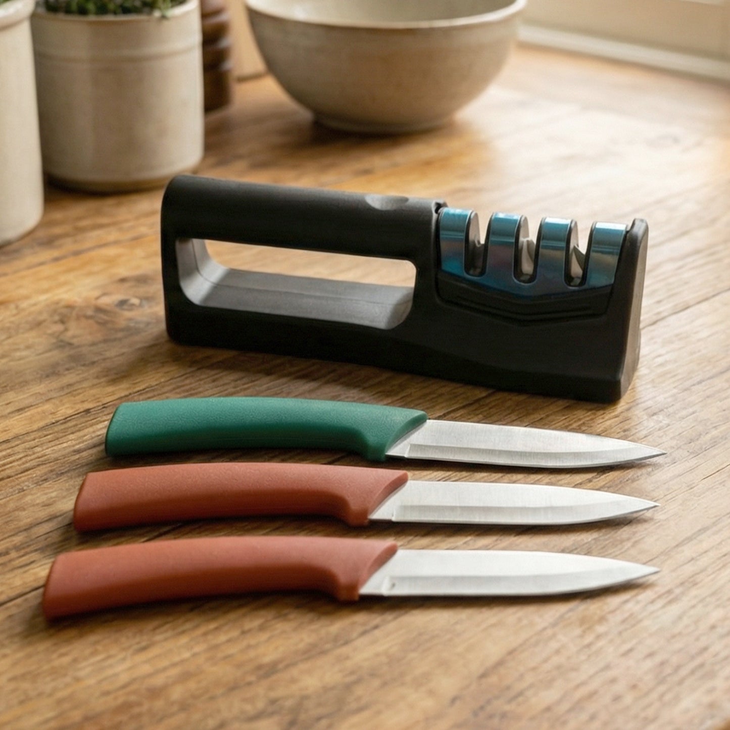 Wukusy 3-piece multipurpose kitchen knife set with sharpener, featuring stainless steel knives and a compact sharpening tool.