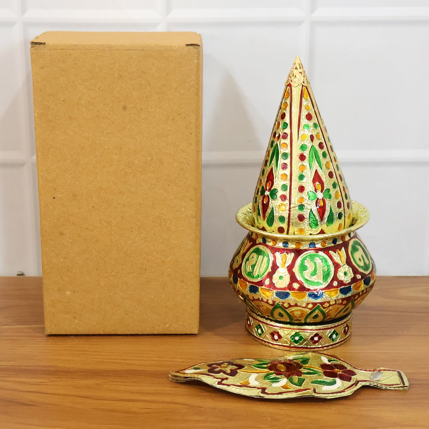Traditional decorative Pooja Kalash set by Wukusy, featuring ornate brass vessels with intricate designs for religious rituals.