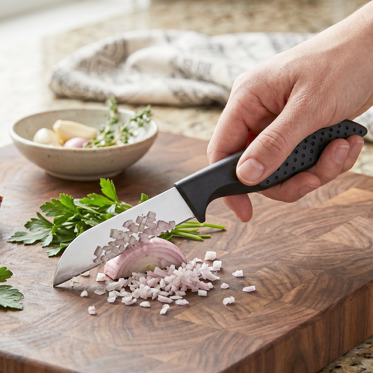 Wukusy 12-piece kitchen knife set with ergonomic handles and stainless steel blades, including chef knives and utensil options.