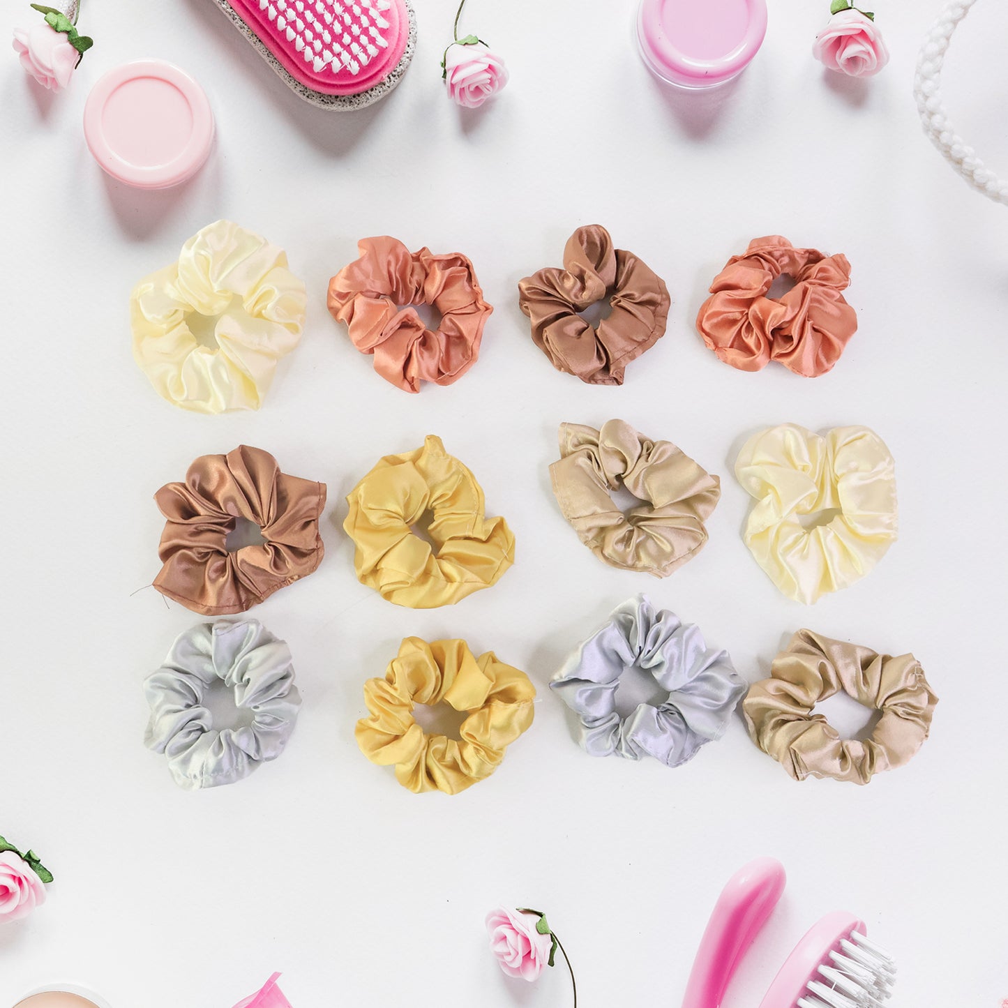 Six Wukusy premium satin hair scrunchies and elastic hair ties for women and girls, shown in a neat arrangement.