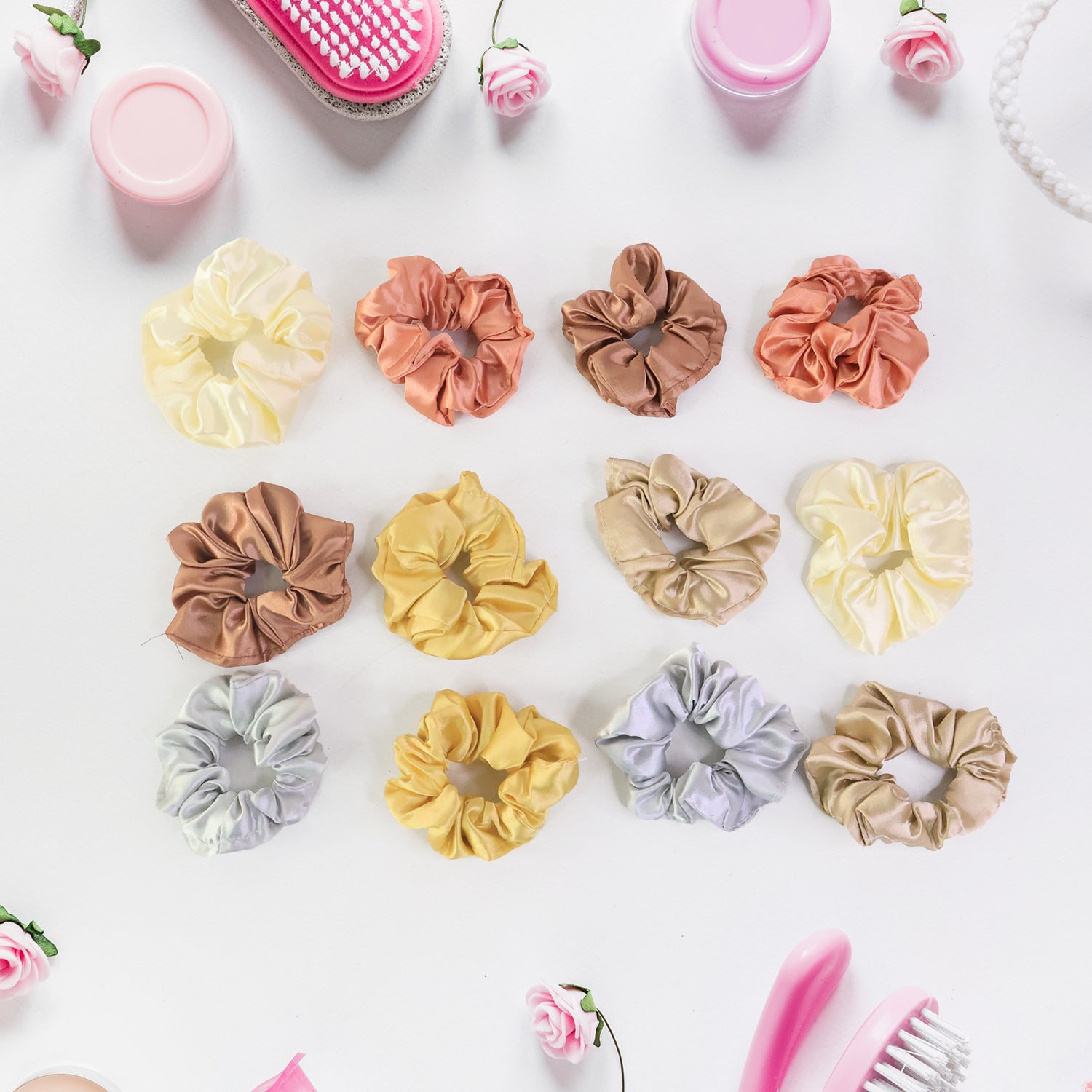 Six Wukusy premium satin hair scrunchies and elastic hair ties for women and girls, shown in a neat arrangement.