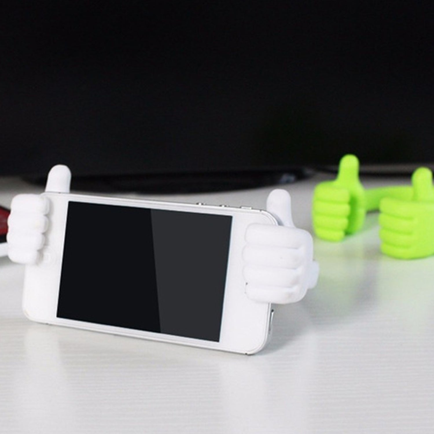 Wukusy hand-shaped mobile stand for supporting phones, suitable for household and office use, shown with colorful box.