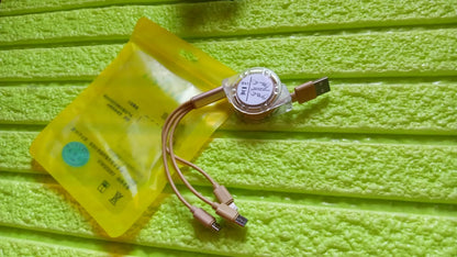 Wukusy 12835 retractable 3-in-1 Micro USB, Type C, and Android charging cable coiled with connectors for mobile devices.