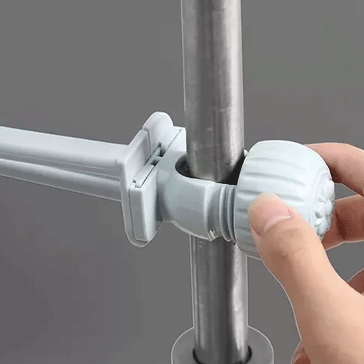 Wukusy multipurpose sink faucet hanging towel and cleaning tool holder attached to a kitchen sink.