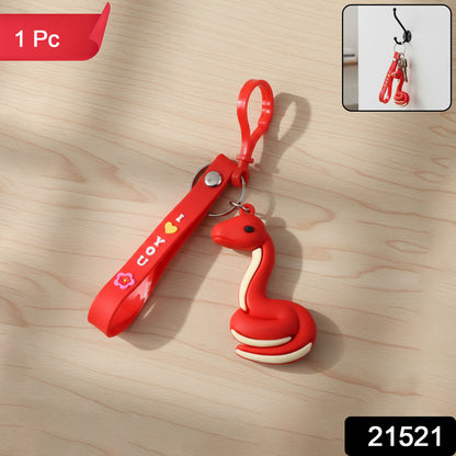 Cute cartoon snake keychain by Wukusy featuring a colorful snake design on a metal keyring.