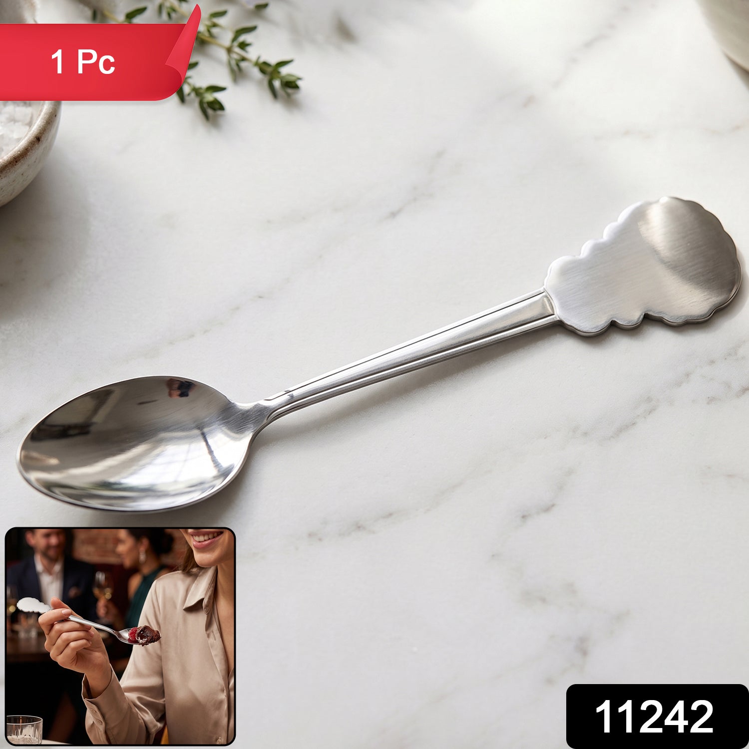 Stainless steel carved handle dinner spoon by Wukusy, showcasing a polished finish and ergonomic design for dining and kitchen use.