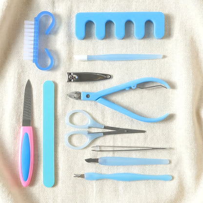 Wukusy 11-in-1 manicure and pedicure nail care kit with various tools arranged in a compact set for personal grooming.