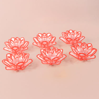 Set of 6 lotus-shaped LED flameless candles for home decor, featuring soft glowing lights and detailed floral design.