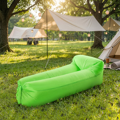 Wukusy inflatable lounger air sofa laid out outdoors, lightweight design, suitable for relaxing or lounging on the grass