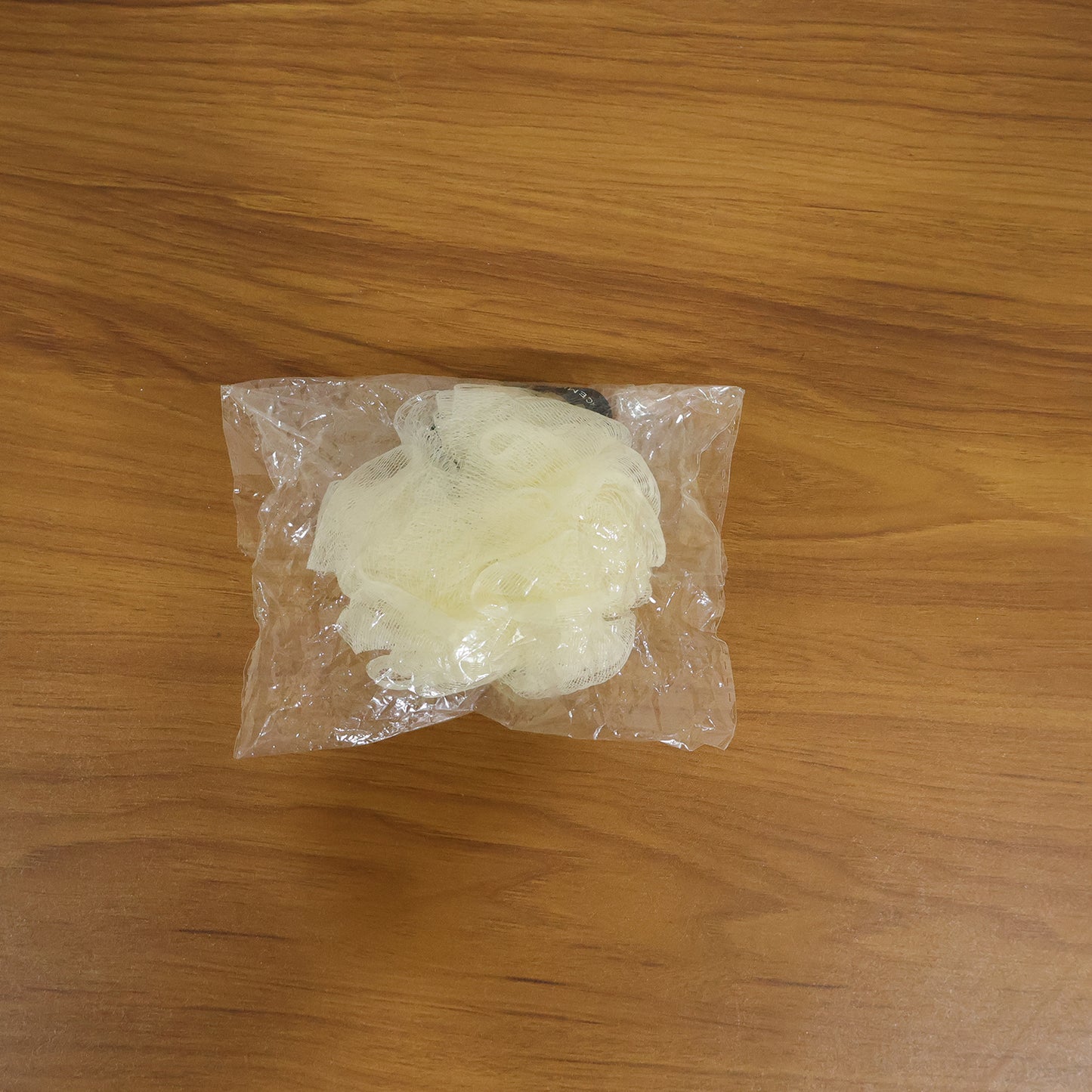 Wukusy soft mesh bath loofah scrubber for gentle exfoliation and cleansing during shower or bath.