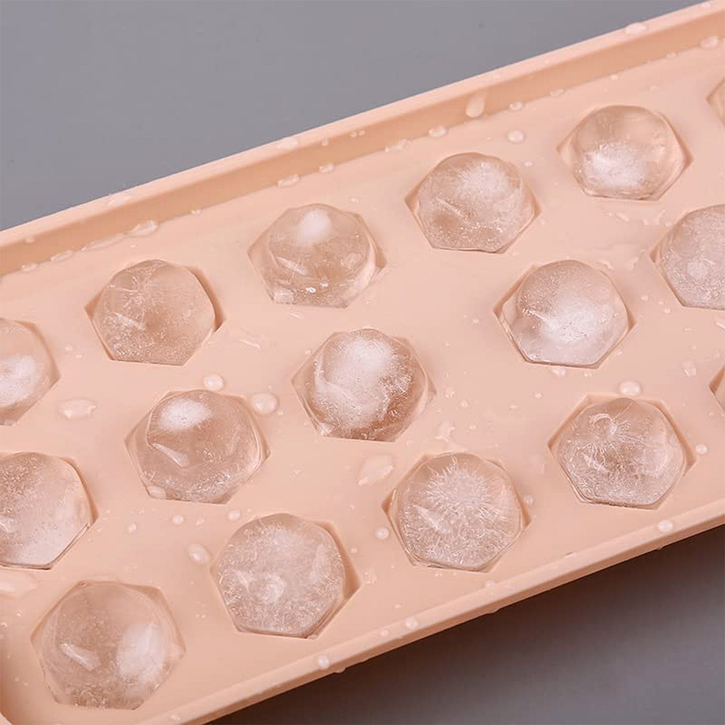 Wukusy durable plastic ice cube tray for home use, showing multiple ice cubes ready to be frozen in the tray.