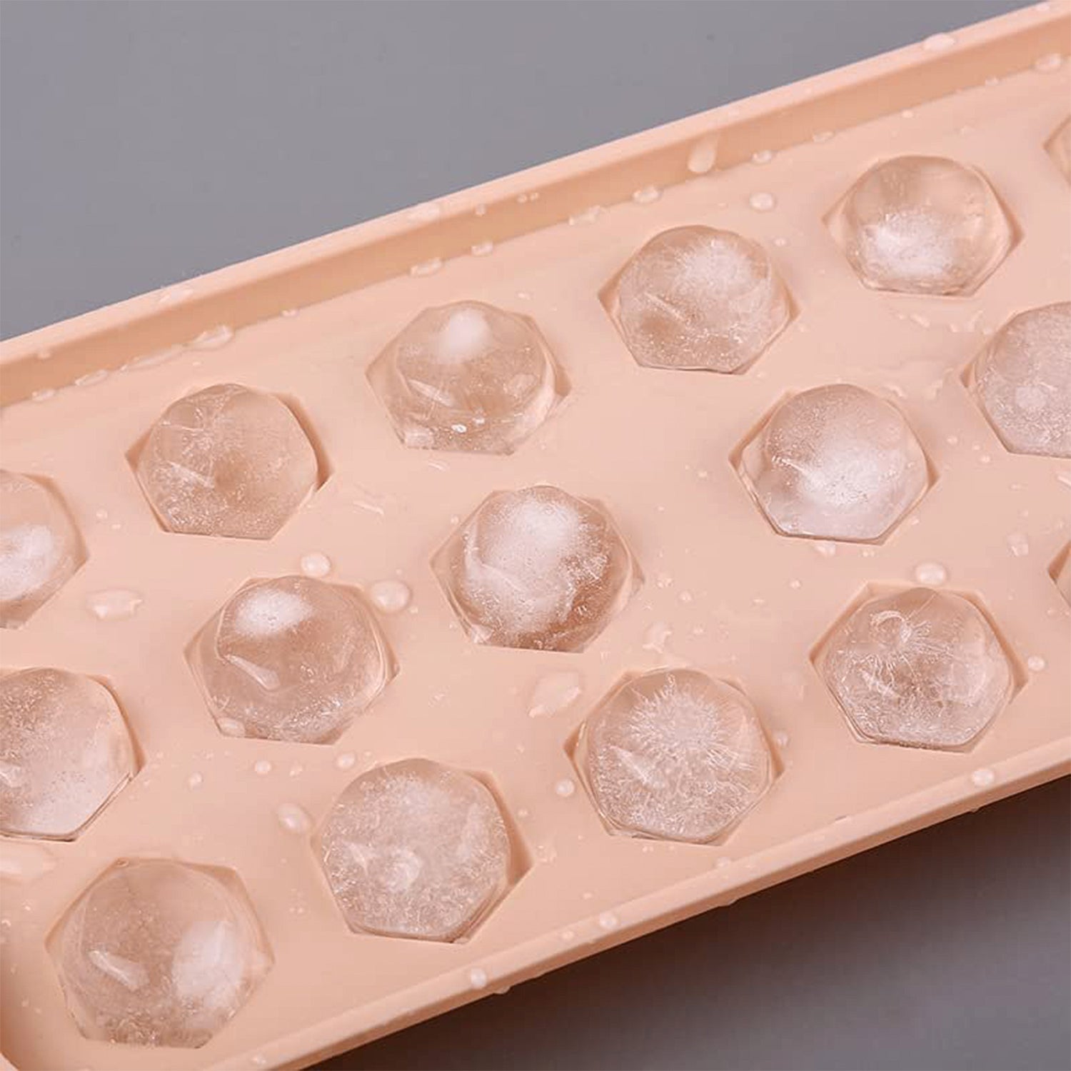 Wukusy durable plastic ice cube tray for home use, showing multiple ice cubes ready to be frozen in the tray.
