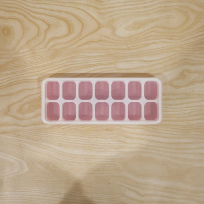 Pink Wukusy plastic ice cube tray with lid, 14-grid multipurpose tray for making ice cubes or small frozen treats.