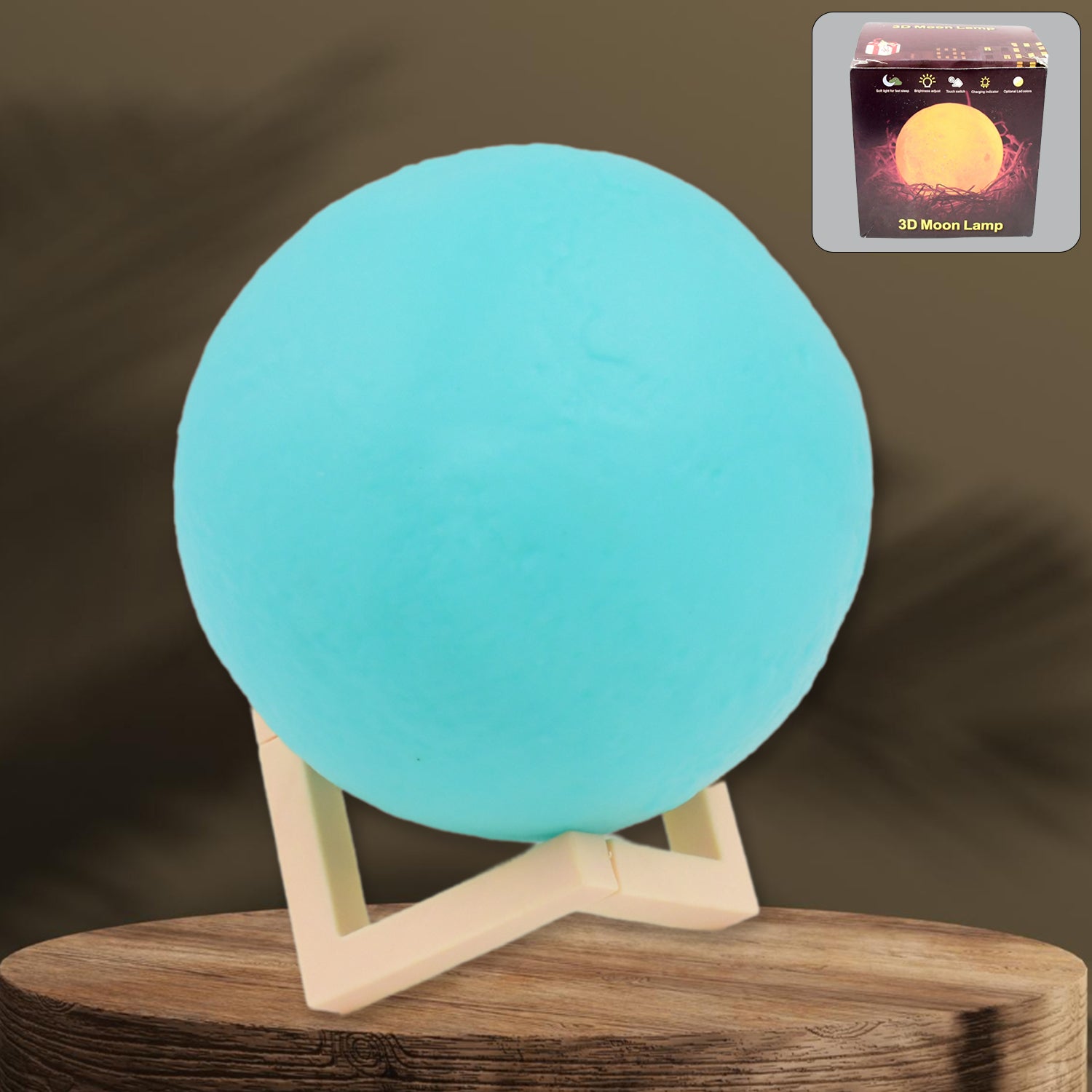 Blue moon night lamp with plastic stand, Wukusy home decor, 15x12 cm, showing the illuminated moon design on a table.