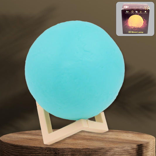 Blue moon night lamp with plastic stand, Wukusy home decor, 15x12 cm, showing the illuminated moon design on a table.