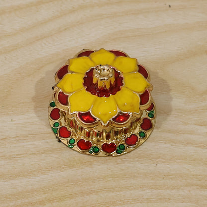 Decorative golden Kankavati Kumkum box for sindoor, traditional pooja accessory, by Wukusy, featuring intricate design and compact size.