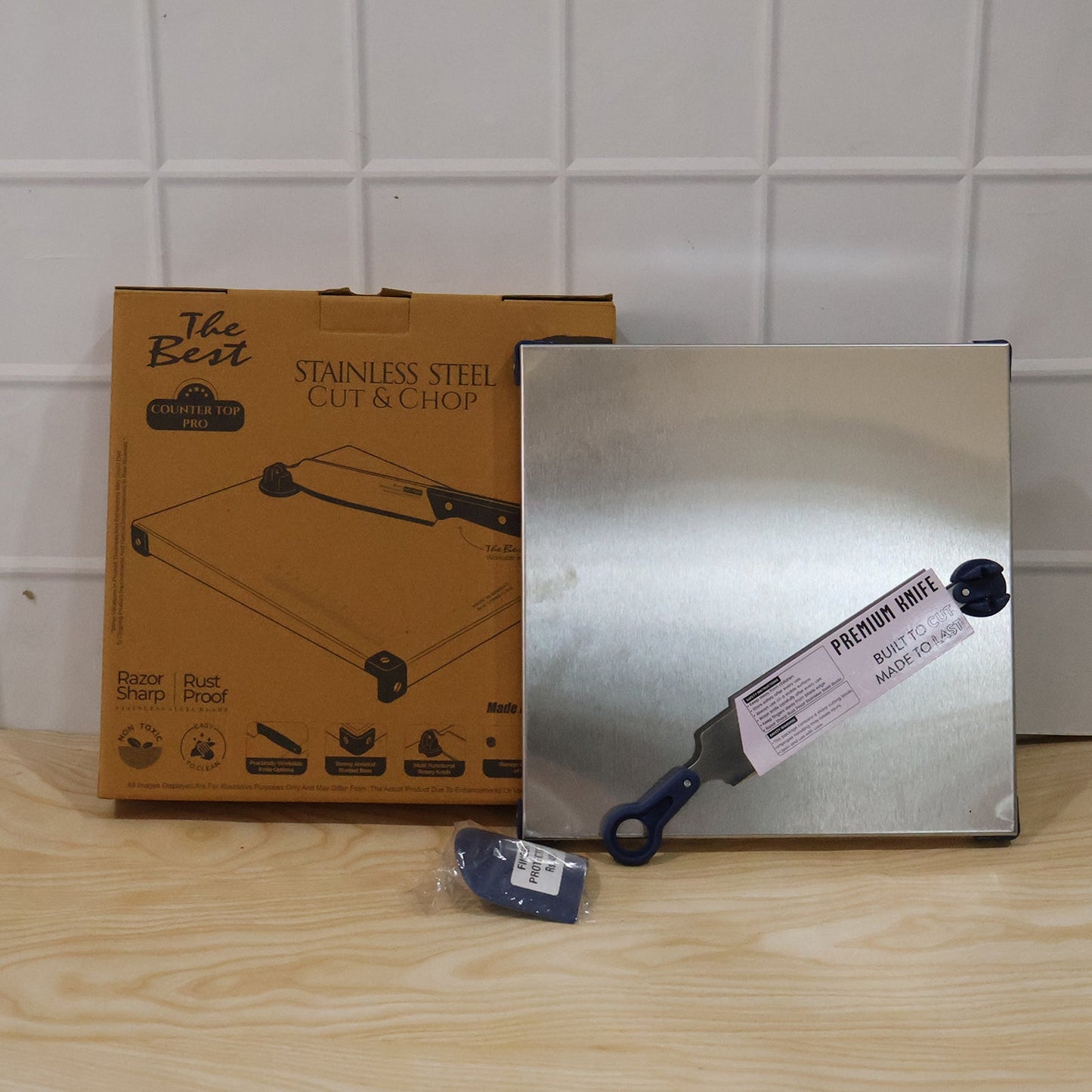 Wukusy stainless steel 2-in-1 cutting and chopping board with knife, finger guard, and set for kitchen prep and food chopping.