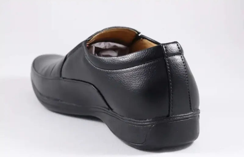 Black men's moccasin formal shoes by ekom, stylish office footwear suitable for boys and men, with a sleek, polished appearance.