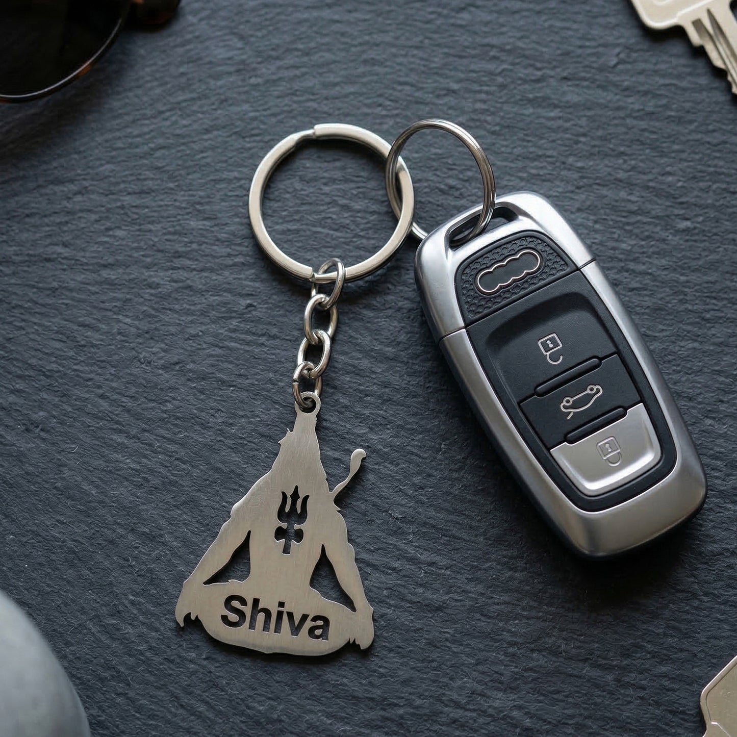 Premium metal Lord Shiva Trishul design keychain from Wukusy, featuring intricate Trishul symbol and detailed craftsmanship.