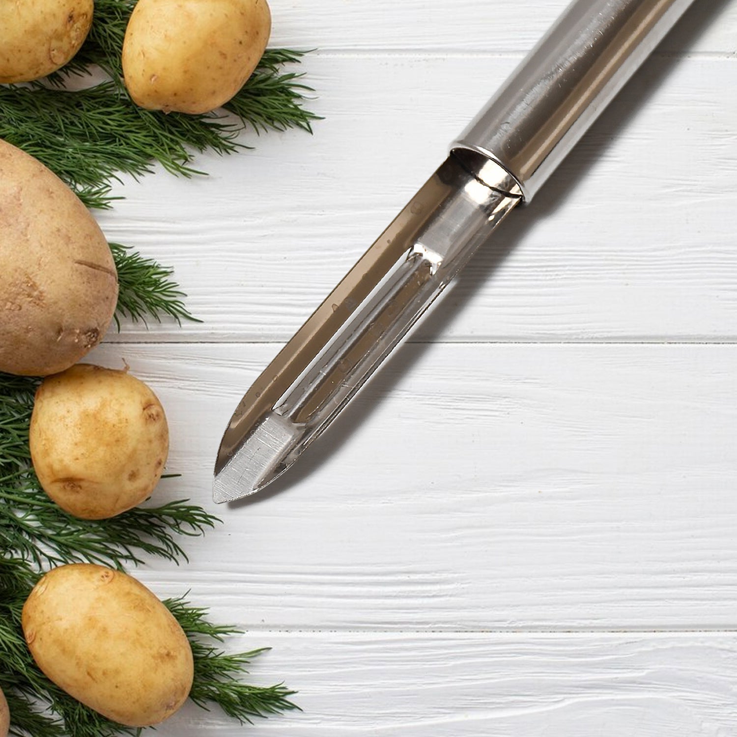 Wukusy 12-pack stainless steel vegetable peelers with handles, ideal for peeling and shredding potatoes, carrots, fruits, and vegetables.