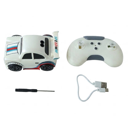 Wukusy mini RC racing car toy with remote control, rechargeable for kids, shown on a smooth surface in the image.