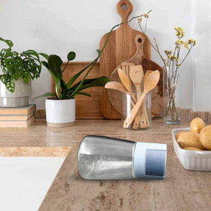 Set of four Wukusy glass salt shakers with precise 0.5g pour spouts, ideal for home, picnic, and camping seasoning.