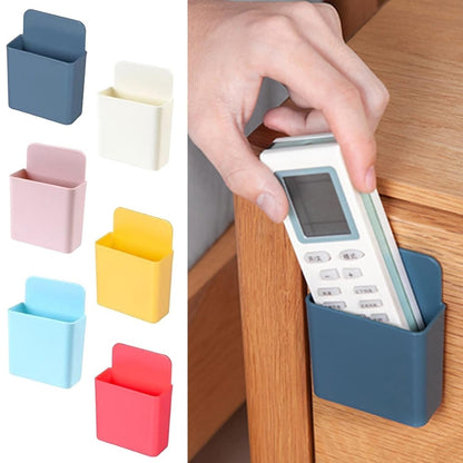 Set of four Wukusy plastic wall-mounted remote and mobile holder stands for convenient storage and organization.