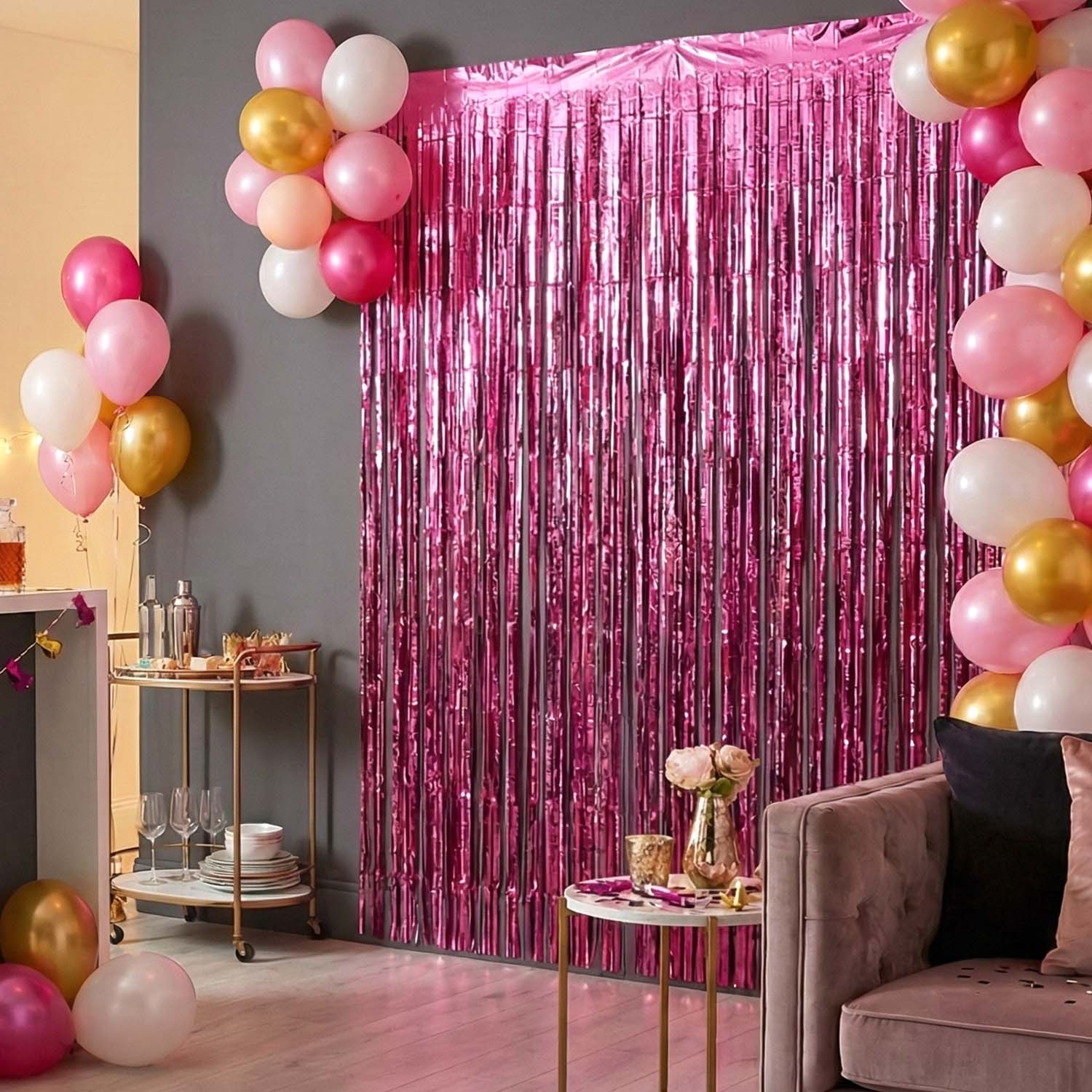 Wukusy decorative foil fringe curtain for birthday party decoration with shiny gold and silver strands hanging in a festive display