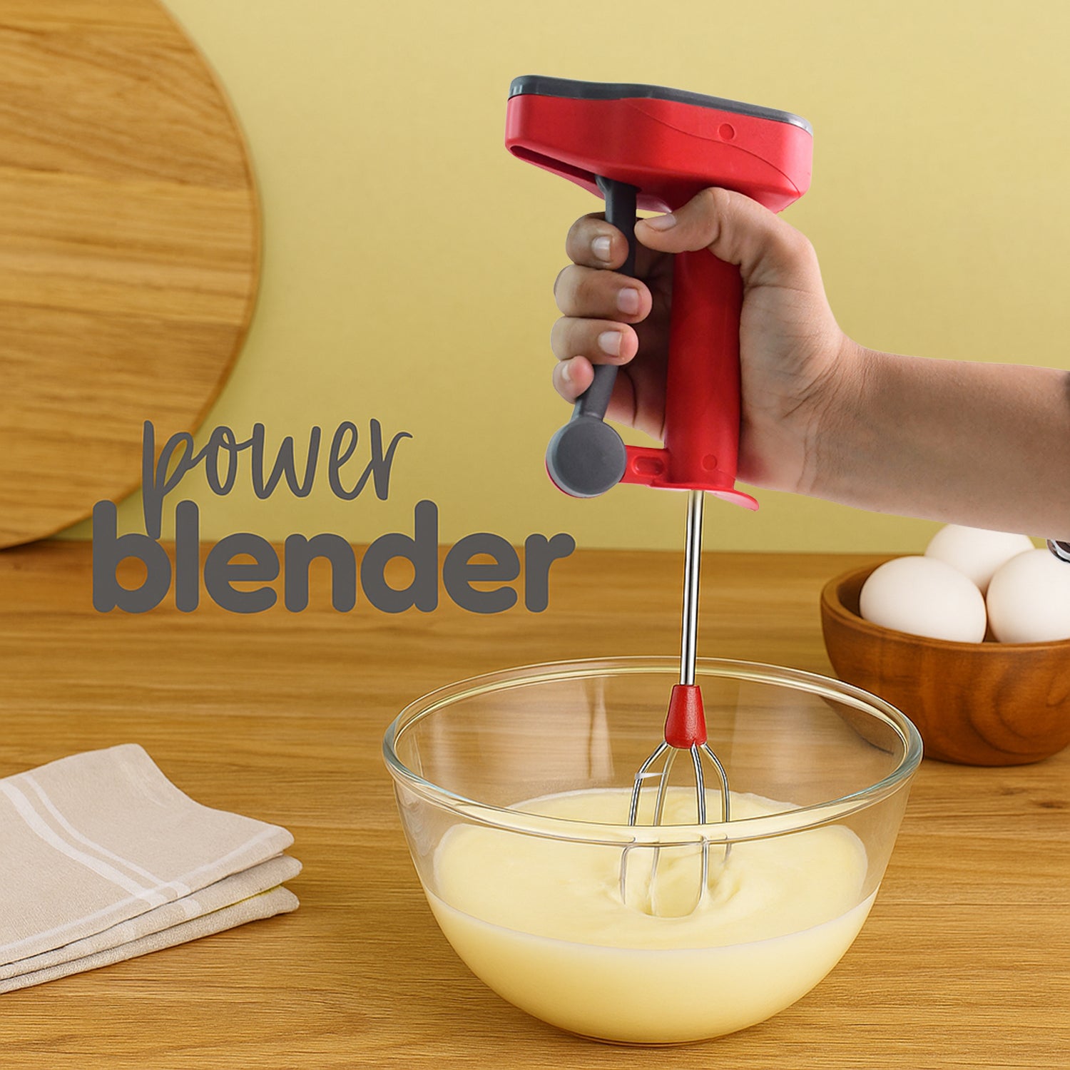 Wukusy Supermom multi-function power blender for liquidizing, beating, and churning, shown blending ingredients in a modern kitchen.