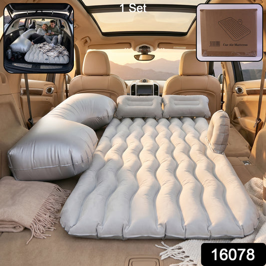 Grey Wukusy portable car air mattress bed set with pump and pillows, fully inflated for comfortable outdoor sleeping.