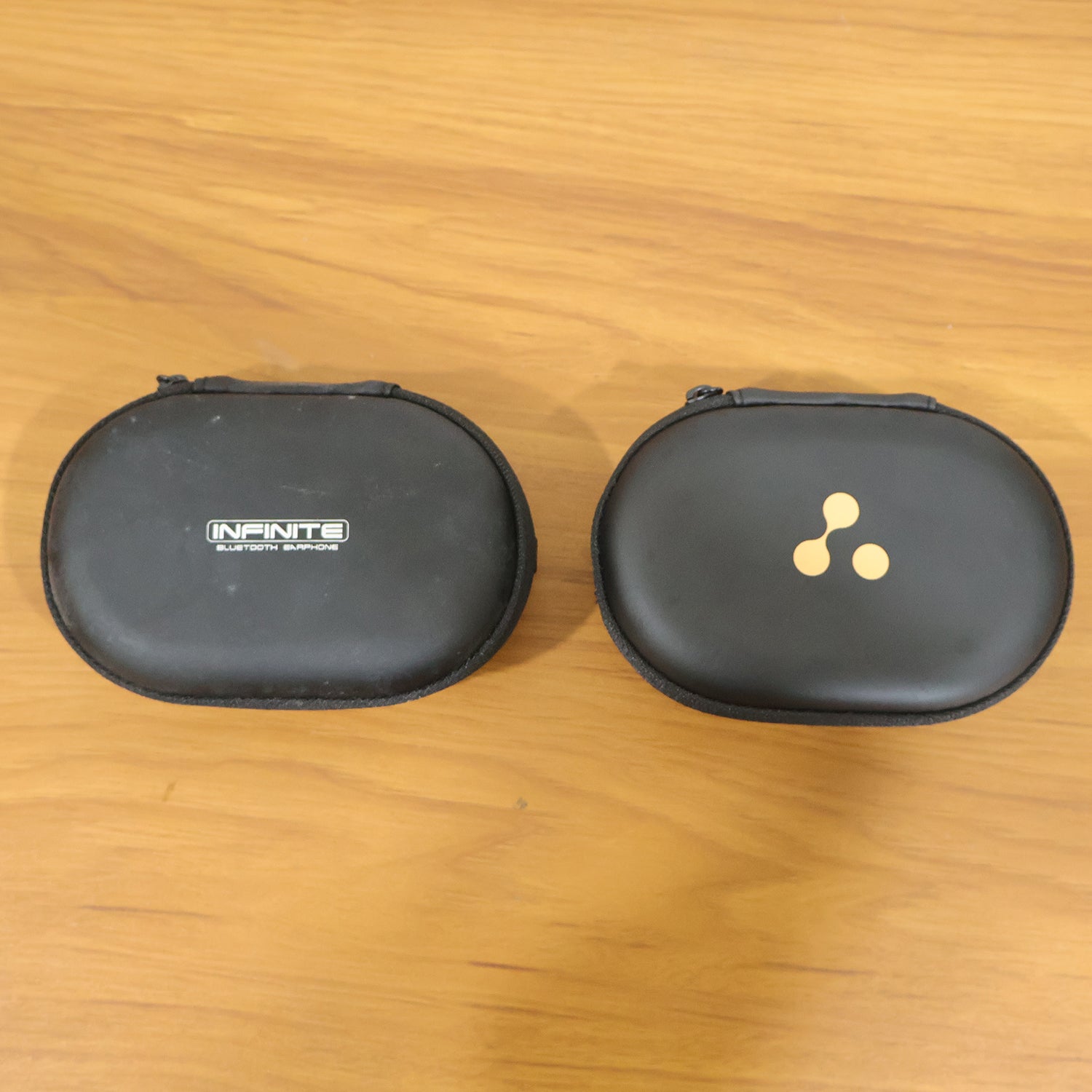 Wukusy portable earphone carrying case in a mixed design, compact and lightweight for easy storage and protection of earphones.