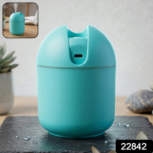 Wukusy portable USB mini air humidifier with cool mist, compact design, emitting visible mist for humidification.