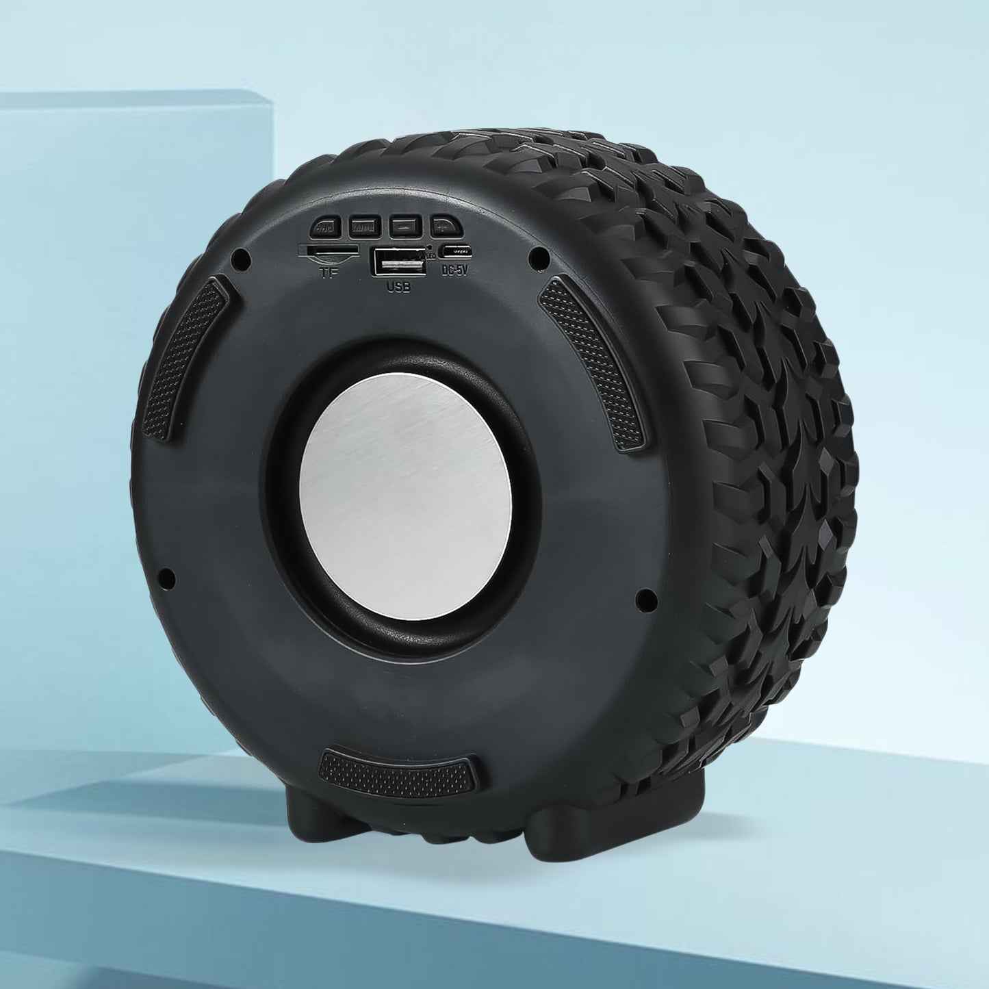 Wukusy portable tire-shaped wireless Bluetooth speaker with wheel design, compact mobile accessory for music on the go.