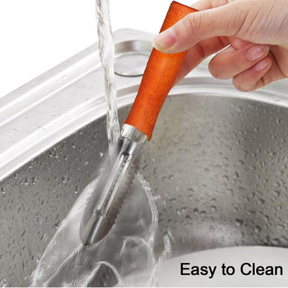 Wukusy vegetable peeler with wooden handle and stainless steel blade, kitchen tool for peeling vegetables efficiently.