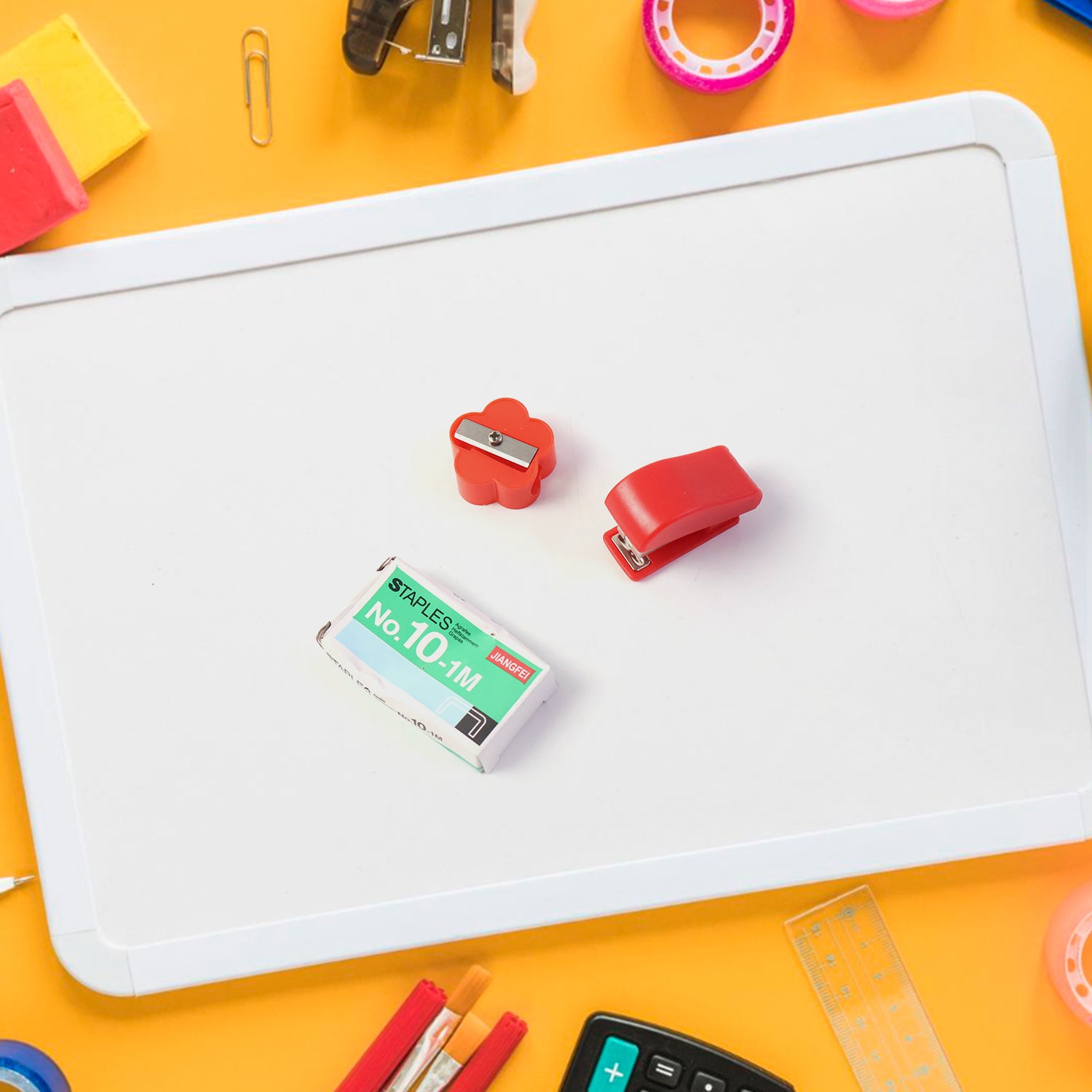 Wukusy 6-in-1 multipurpose mini stationery kit for students with pens, pencils, eraser, sharpener, and additional tools inside.