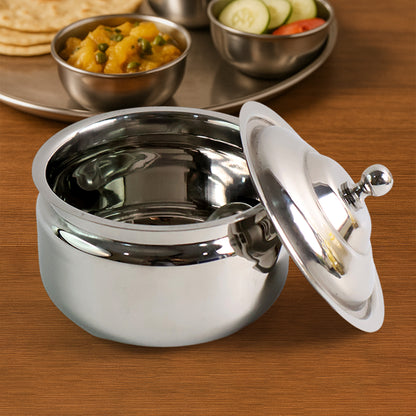 Wukusy premium stainless steel ghee pot with a lid, suitable for kitchen use and cooking traditional Indian dishes.