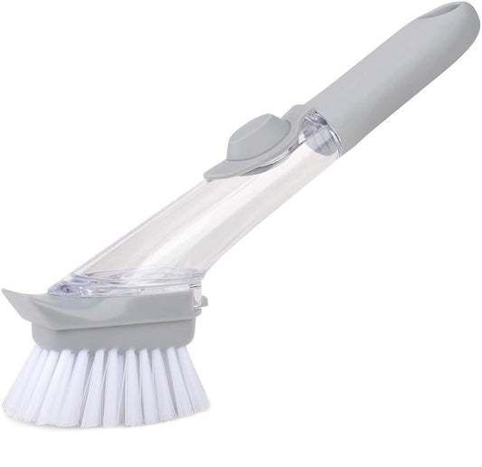Wukusy 1271 automatic liquid dispenser and dish scrub brush with ergonomic handle for efficient kitchen cleaning.